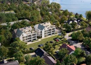 an aerial view of a large white building with a yard at Villa Neptun Gdańsk 5 1 9 1 0 2 1 3 0 in Gdańsk