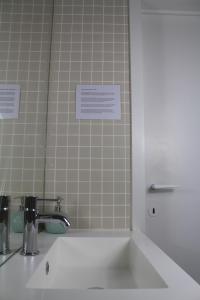 Ένα μπάνιο στο Sea view apartment Mariakerke-Bad - La Brise
