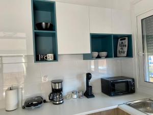 A kitchen or kitchenette at Menta House