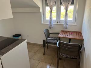 Kuchyň nebo kuchyňský kout v ubytování Apartments Villa Zdrava