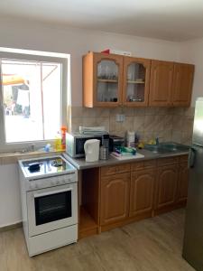 A kitchen or kitchenette at Sajó Vendégház