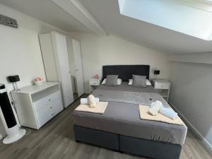 Postel nebo postele na pokoji v ubytování Apartments Villa Zdrava