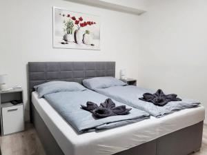 Postel nebo postele na pokoji v ubytování Apartman Maruska