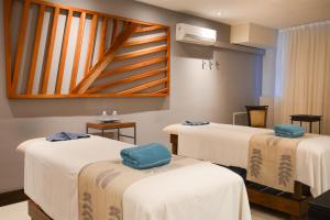 Cama ou camas em um quarto em DiplomaticHotel