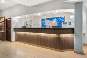 a lobby of a hospital with a reception counter at Holiday Inn Express Wenatchee, an IHG Hotel in Wenatchee