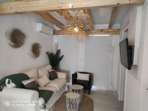 A seating area at Beach and Sun - Paseo Marítimo -Playa