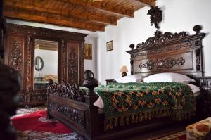 Ένα ή περισσότερα κρεβάτια σε δωμάτιο στο Casa Veche
