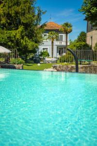 The swimming pool at or close to Villa Moiacchina Luxury Home