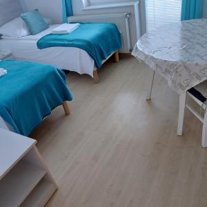 Pokoje gościnne Jutrzenka客房内的一张或多张床位