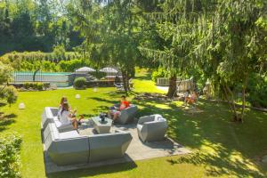 A garden outside Villa Moiacchina Luxury Home