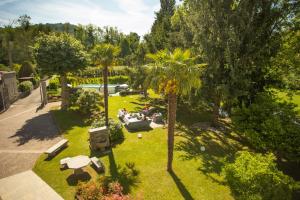 A garden outside Villa Moiacchina Luxury Home