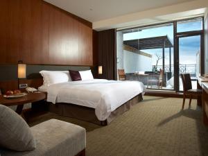 Letto o letti in una camera di Silks Place Yilan