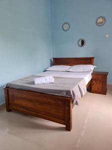 Postel nebo postele na pokoji v ubytování Nalluran illam - 2 bed room