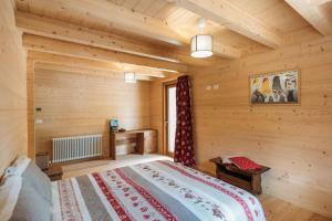 Postel nebo postele na pokoji v ubytování Chalet Gaspard