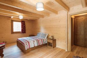 Postel nebo postele na pokoji v ubytování Chalet Gaspard