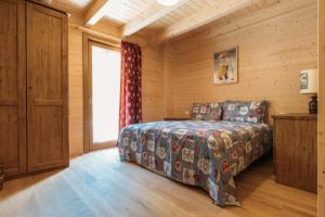 Postel nebo postele na pokoji v ubytování Chalet Gaspard