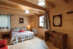 Postel nebo postele na pokoji v ubytování Chalet Gaspard