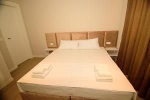 Postel nebo postele na pokoji v ubytování Solea Hotel