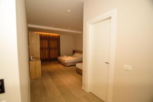 Postel nebo postele na pokoji v ubytování Solea Hotel