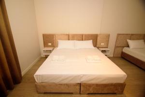 Postel nebo postele na pokoji v ubytování Solea Hotel