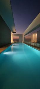Πισίνα στο ή κοντά στο Apartamento vista al rio- TOPACIO TOWER