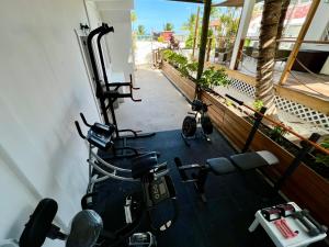 an overhead view of a gym with two exercise bikes at Treetops Hotel in Caye Caulker