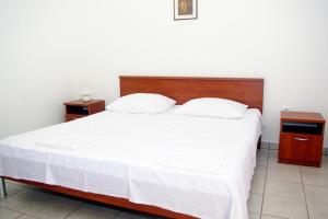Кровать или кровати в номере Apartment Pag 4119c