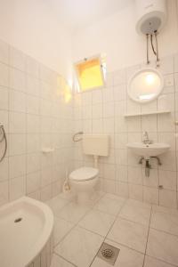 Kúpeľňa v ubytovaní Apartment Arbanija 1122a + 29 fotografií