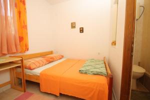 Posteľ alebo postele v izbe v ubytovaní Seaside secluded apartments Cove Smokvina, Hvar - 4036