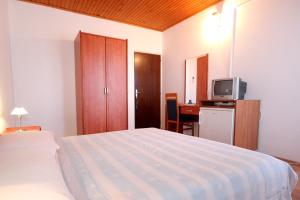 Ένα ή περισσότερα κρεβάτια σε δωμάτιο στο Double Room Mandre 3557a +10 φωτογραφίες