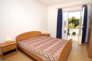 Posteľ alebo postele v izbe v ubytovaní Apartments by the sea Molunat, Dubrovnik - 2137