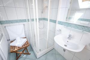 a bathroom with a shower and a sink at Studio Zavala 2061a in Zavala +16 photos