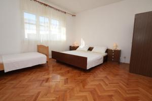 Fotografia z galérie ubytovania Apartments with a parking space Vinisce, Trogir - 1165 v destinácii Vinišće