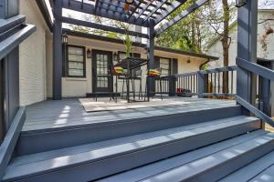 a front porch with a pergola and a house at Heart Of Buckhead5bed 5 Bath in Atlanta