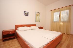 Posteľ alebo postele v izbe v ubytovaní Apartments by the sea Podstrana, Split - 2087