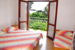 Fotografie z fotogalerie ubytování Apartments by the sea Cove Ljubljeva, Trogir - 2194 v destinaci Voluja
