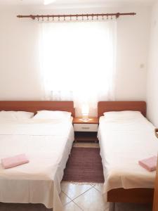 Fotografia z galérie ubytovania Apartment Metajna 4126a v destinácii Zubovići