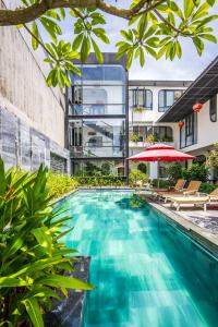 an image of a swimming pool in front of a building at Life Boutique Hotel in Hue