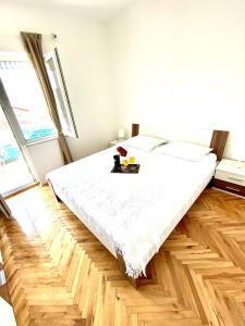 Posteľ alebo postele v izbe v ubytovaní Apartment Metajna 4121b