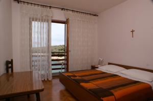 Fotografie z fotogalerie ubytování Double Room Mulobedanj 4061a v destinaci Lun