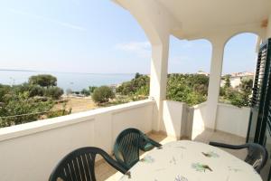 Balkón nebo terasa v ubytování Apartments by the sea Mandre, Pag - 4084