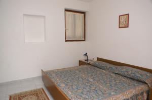 Postel nebo postele na pokoji v ubytování Apartments by the sea Novalja, Pag - 4114