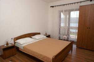 Posteľ alebo postele v izbe v ubytovaní Apartments and rooms by the sea Zubovici, Pag - 4065