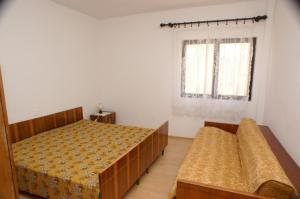 Posteľ alebo postele v izbe v ubytovaní Apartments and rooms by the sea Zubovici, Pag - 4065