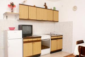 Kuchyň nebo kuchyňský kout v ubytování Apartments with parking space Metajna, Pag - 4116