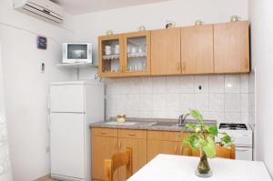 Kuchyň nebo kuchyňský kout v ubytování Apartments with parking space Metajna, Pag - 4116