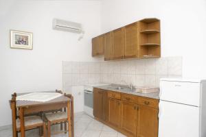 Kuchyň nebo kuchyňský kout v ubytování Apartments with parking space Metajna, Pag - 4116