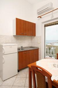 Kuchyň nebo kuchyňský kout v ubytování Apartments with parking space Metajna, Pag - 4116