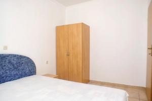 Posteľ alebo postele v izbe v ubytovaní Apartment Kustici 4129b