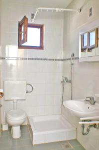 Kúpeľňa v ubytovaní Apartment Kustici 4129b